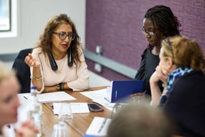 Public sector team members in a workshop, sharing strengths and listening to one another.